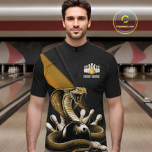 Load image into Gallery viewer, Male model wearing a black bowling quarter-zip in a bowling lane with yellow cobra artwork and bowling pin graphics.