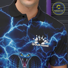 Load image into Gallery viewer, Close-up of the left chest on a bowling polo featuring a blue cobra and bowling ball with lightning effects.