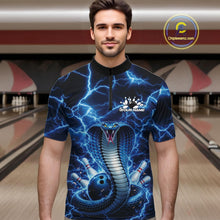 Load image into Gallery viewer, Male model at the bowling lane wearing a quarter-zip with blue cobra and bowling ball graphics against lightning.