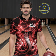 Load image into Gallery viewer, Male model at the bowling lane wearing a bowling polo with red cobra artwork and lightning-inspired bowling design.