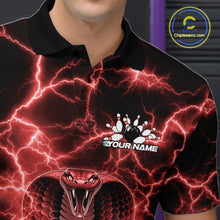 Load image into Gallery viewer, Left chest close-up of a bowling polo featuring a red cobra and bowling ball motif with lightning accents.