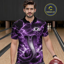 Load image into Gallery viewer, Male model wearing a bowling polo in a bowling lane with purple cobra graphics wrapped around a bowling ball and lightning effects.