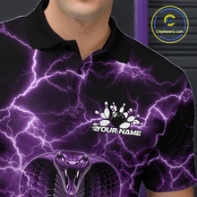 Load image into Gallery viewer, Close-up left chest detail of a bowling polo featuring a purple cobra coiled around a bowling ball with lightning artwork.