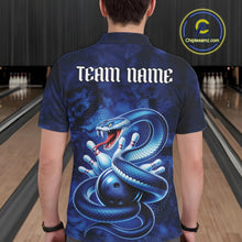 Load image into Gallery viewer, Back view of a mens bowling polo showcasing a blue cobra, bowling ball, and scattered pins.