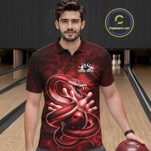 Load image into Gallery viewer, Male model in a bowling alley wearing a bowling polo with red cobra artwork and scattered bowling pins.