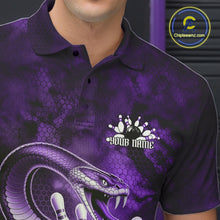 Load image into Gallery viewer, Close-up left chest detail of a bowling polo featuring a purple cobra coiled around a bowling ball with scattered pins.