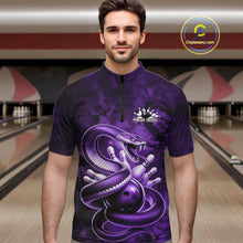 Load image into Gallery viewer, Male model wearing a bowling quarter-zip in a bowling lane with purple cobra artwork wrapped around a bowling ball and scattered pins.