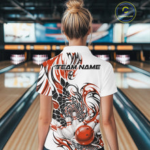 Load image into Gallery viewer, Back view of a female model wearing a white bowling quarter-zip shirt with orange and black tribal artwork, scale-like patterns, and a red bowling action illustration