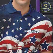Load image into Gallery viewer, Close-up of the left chest on a bowling polo shirt featuring a funny bowling ball surrounded by cheerful animated pins with flowing American flag waves and scattered stars.
