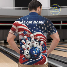 Load image into Gallery viewer, Front view of a male model wearing a bowling quarter zip shirt featuring a funny bowling ball surrounded by cheerful animated pins with flowing American flag waves and scattered stars in a bowling lane.