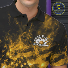 Load image into Gallery viewer, Left chest detail of a black and yellow bowling polo featuring a bowling ball crashing through pins with flames.