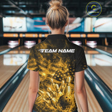 Load image into Gallery viewer, Back view of a womens black and yellow bowling polo displaying blazing bowling graphics and American flag details.