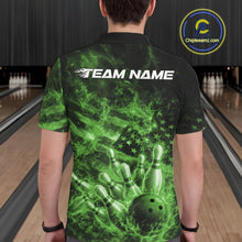 Load image into Gallery viewer, Back view of a mens black and green bowling polo displaying bowling pins, flames, and flag-inspired graphics.
