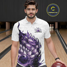 Load image into Gallery viewer, Front view of a male model wearing a white, blue, and purple bowling polo with fiery bowling-themed artwork in a bowling center.