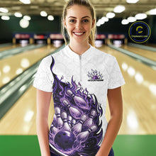 Load image into Gallery viewer, Front view female model at bowling lane wearing white, blue and purple quarter zip shirt showing flaming bowling ball striking pins with energetic cosmic fire illustration.