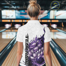Load image into Gallery viewer, Back view female model in bowling lane wearing white, blue and purple quarter zip featuring flaming bowling ball striking pins with dynamic cosmic fiery graphics.