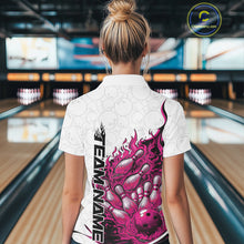 Load image into Gallery viewer, Back view female model in bowling lane wearing polo shirt with flaming bowling ball crashing into pins pink dynamic fire bowling design