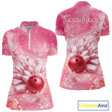 Load image into Gallery viewer, Front and back view of a women’s bowling quarter zip shirt featuring a pink bowling ball striking pins with butterflies and sparkling diamond accents.