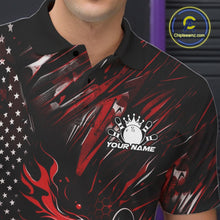 Load image into Gallery viewer, Close-up left chest view of a black and red bowling polo shirt featuring a patriotic bowling ball and pin graphic with flame effects.