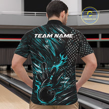 Load image into Gallery viewer, Front view of a male model in a bowling venue wearing a black and turquoise blue quarter-zip shirt featuring a flaming bowling ball and pin design.