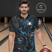 Load image into Gallery viewer, Male model wearing a black and blue bowling polo shirt at a bowling lane with patriotic bowling strike graphics and fiery details.