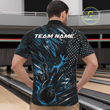 Load image into Gallery viewer, Front view of a male model in a bowling alley wearing a black and blue quarter-zip shirt featuring a bowling strike scene with flames.
