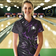 Load image into Gallery viewer, Female model at a bowling lane wearing a black and purple bowling polo shirt with bowling strike artwork and patriotic flame details.