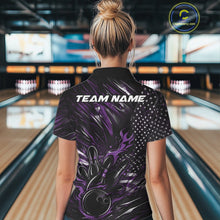 Load image into Gallery viewer, Female model at a bowling lane, back view of black and purple quarter zip shirt showcasing patriotic flames bowling ball hitting pins with American flag accents