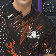 Load image into Gallery viewer, Close-up left chest view of a black and orange bowling polo shirt featuring a flaming bowling ball and patriotic pin artwork.