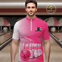Load image into Gallery viewer, Front view of a male model in a bowling lane wearing a quarter zip shirt with bowling ball and pins arranged within a pink gradient layout.