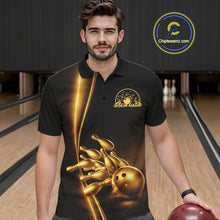 Load image into Gallery viewer, In bowling lane front view male model wearing bowling polo shirt, black base with golden bowling ball and pins graphic, energetic sports lighting