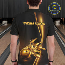 Load image into Gallery viewer, Bowling lane back view male model wearing bowling polo shirt, black base with golden bowling ball and pins graphic, promotional sports atmosphere