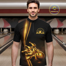 Load image into Gallery viewer, Front view of a male model in a bowling lane wearing a black quarter-zip shirt with golden bowling ball and pins artwork and refined bowling visuals.