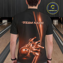 Load image into Gallery viewer, Bowling lane back view male model wearing bowling polo shirt, black base with orange bowling ball and pins graphic, promotional sports atmosphere