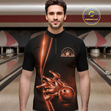 Load image into Gallery viewer, Front view of a male model in a bowling lane wearing a black quarter-zip shirt with orange bowling ball and pins artwork and dynamic bowling action visuals.