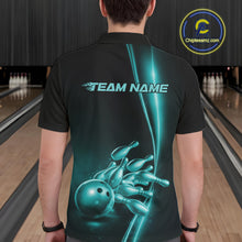 Load image into Gallery viewer, Bowling lane back view male model wearing bowling polo shirt, black base with turquoise blue bowling ball and pins graphic, promotional sports atmosphere
