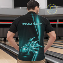 Load image into Gallery viewer, Front view of a male model in a bowling lane wearing a black quarter-zip shirt with turquoise blue bowling ball and pins design and clean athletic bowling graphics.