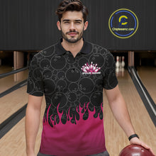 Load image into Gallery viewer, Front view of a male model in a bowling lane wearing a black polo shirt with vibrant pink flames and bowling ball pattern with dynamic bowling strike visuals.