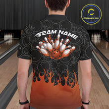 Load image into Gallery viewer, Back view of a male model in a bowling lane wearing a black polo shirt featuring vibrant orange flames and bowling ball pattern with energetic bowling visuals.