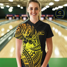 Load image into Gallery viewer, Female model wearing a black and gold bowling quarter-zip shirt at the lane with Polynesian-style bowling artwork.
