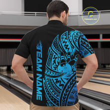 Load image into Gallery viewer, Front view of a male model in a black and blue bowling quarter-zip shirt featuring tribal bowling artwork and swirl accents.
