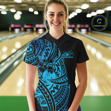 Load image into Gallery viewer, Female model wearing a black and blue bowling quarter-zip shirt at the bowling lane with Polynesian-inspired bowling motifs.
