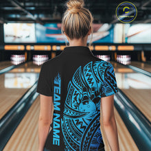 Load image into Gallery viewer, Back view of a female model in a black and blue bowling quarter-zip shirt displaying tribal bowling artwork.