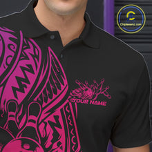 Load image into Gallery viewer, Left chest close-up of a black and pink bowling polo shirt featuring bowling motifs framed by tribal patterns.