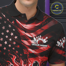 Load image into Gallery viewer, Left chest close-up of a black bowling polo shirt featuring red flame bowling artwork and flag-themed graphics.