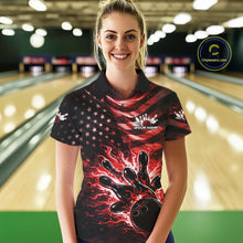 Load image into Gallery viewer, Female model wearing a black bowling polo shirt at the bowling lane with red flame bowling artwork and distressed patriotic details.
