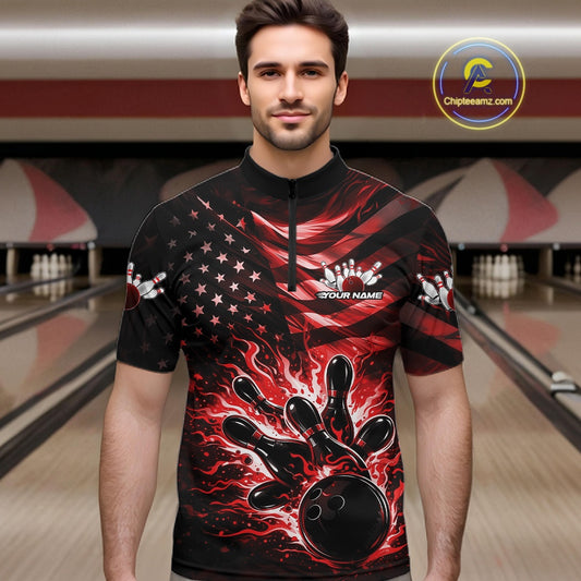 Male model wearing a black bowling quarter-zip shirt at the bowling lane with red flame bowling graphics and patriotic accents.