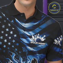 Load image into Gallery viewer, Left chest close-up of a black bowling polo shirt featuring blue flame bowling graphics and distressed flag details.