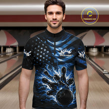 Load image into Gallery viewer, Male model wearing a black bowling quarter-zip shirt at the lane with blue flame bowling artwork and flag-inspired elements.