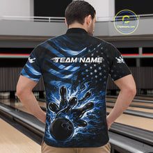 Load image into Gallery viewer, Front view of a male model in a black bowling quarter-zip shirt showcasing blue flame bowling strike graphics and distressed flag details.